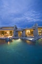 Swimming Pool And Illuminated Modern House