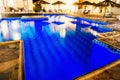 Swimming pool illuminated at night