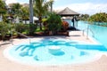 Swimming pool with jacuzzi at luxury hotel Royalty Free Stock Photo