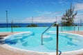 Swimming pool with jacuzzi at luxury hotel Royalty Free Stock Photo