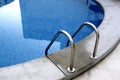 Swimming pool ladder detail Royalty Free Stock Photo