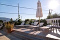 Swimming pool of luxury holiday villa, amazing nature. Relax near swimming pool with handrail, deck chairs, sun loungers. Royalty Free Stock Photo