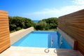 Swimming pool by luxury sea view villa Royalty Free Stock Photo