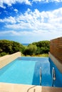 Swimming pool by luxury sea view villa Royalty Free Stock Photo