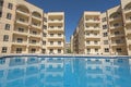 Swimming pool in a luxury tropical apartment resort Royalty Free Stock Photo