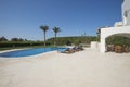 Swimming pool at a luxury tropical holiday villa resort Royalty Free Stock Photo