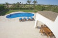Swimming pool at at luxury tropical holiday villa resort Royalty Free Stock Photo