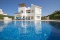 Swimming pool at a luxury tropical holiday villa resort Royalty Free Stock Photo