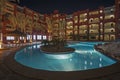 Swimming pool in luxury tropical hotel resort at night Royalty Free Stock Photo