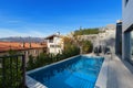 Swimming pool of a modern house Royalty Free Stock Photo