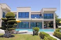 Swimming pool and modern luxury holiday villa, Belek, Turkey Royalty Free Stock Photo