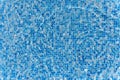 Swimming pool mosaic bottom caustics ripple like sea water and flow with waves background with sun light reflection Royalty Free Stock Photo