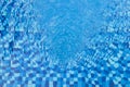 Swimming pool mosaic tiles and water Royalty Free Stock Photo