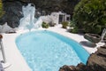 Swimming pool in natural volcanic rock area