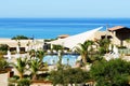 Swimming pool near beach at the luxury hotel Royalty Free Stock Photo