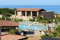 Swimming pool near beach at the luxury hotel Royalty Free Stock Photo