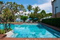 Swimming pool near ocean with blue sky in summer Royalty Free Stock Photo