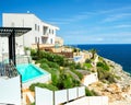 A swimming pool next to the ocean. Royalty Free Stock Photo