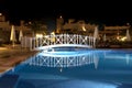 Swimming pool by night Royalty Free Stock Photo