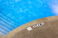 Swimming pool with No Diving warning sign and 3 ft depth marker Royalty Free Stock Photo