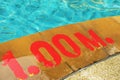 Swimming pool with Number 1.00 on ground at hotel Royalty Free Stock Photo