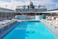 Swimming pool onboard Crystal Serenity cruise ship open deck Royalty Free Stock Photo