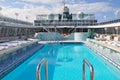 Swimming pool onboard Crystal Serenity cruise ship open deck Royalty Free Stock Photo