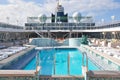 Swimming pool onboard Crystal Serenity cruise ship open deck Royalty Free Stock Photo