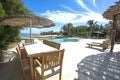 Swimming pool and outdoor dining area at at luxury tropical holiday villa resort Royalty Free Stock Photo