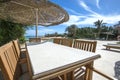 Swimming pool and outdoor dining area at at luxury tropical holiday villa resort Royalty Free Stock Photo