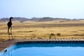 The swimming pool overloking the desert Royalty Free Stock Photo
