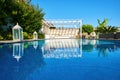 Swimming pool and patio of a residential Aegean or Mediterranean villa Royalty Free Stock Photo