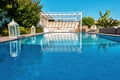 Swimming pool and patio of a residential Aegean or Mediterranean villa Royalty Free Stock Photo