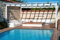 Swimming pool and patio of a residential Aegean or Mediterranean villa Royalty Free Stock Photo