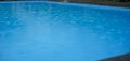 Swimming pool with raindrops. Autumn season Royalty Free Stock Photo