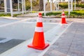 Swimming pool repair - safety cone on edge Royalty Free Stock Photo