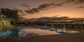 swimming pool in a residential complex in the sunset light 1 Royalty Free Stock Photo