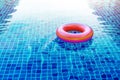 Swimming Pool Ring Float over Blue Water Royalty Free Stock Photo