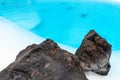 A swimming pool with rocks as decoration Royalty Free Stock Photo