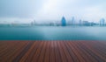 Swimming pool on roof top with beautiful city skyline view