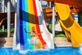 Swimming pool slides for child on water slide at aquapark.