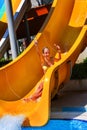 Swimming pool slides for children on water slide at aquapark. Royalty Free Stock Photo