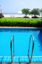 Swimming pool with stair at the beach Royalty Free Stock Photo