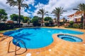 Swimming pool with stair. Grab bars ladder in the blue swimming pool. Poolside with blue clear water and ladder. Stair at the side Royalty Free Stock Photo