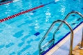 Swimming pool with stair ,selective focus.Metal staircase. Pool. Ladder. Release to the pool.activity relaxation.Place Royalty Free Stock Photo