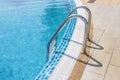 Stainless steel stairs for swimming pool Royalty Free Stock Photo