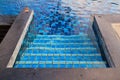 Swimming pool with stairs. Royalty Free Stock Photo