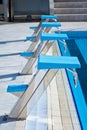 Swimming pool starting blocks in a row Royalty Free Stock Photo