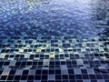 Swimming pool steps with clear water surface background. Royalty Free Stock Photo