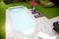 Swimming pool with deck top view Royalty Free Stock Photo